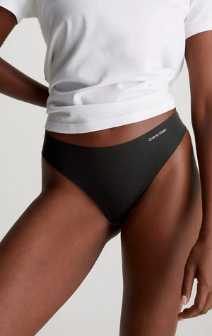 Dámské bezešvé tanga Calvin Klein QD3558E UB1 3PACK