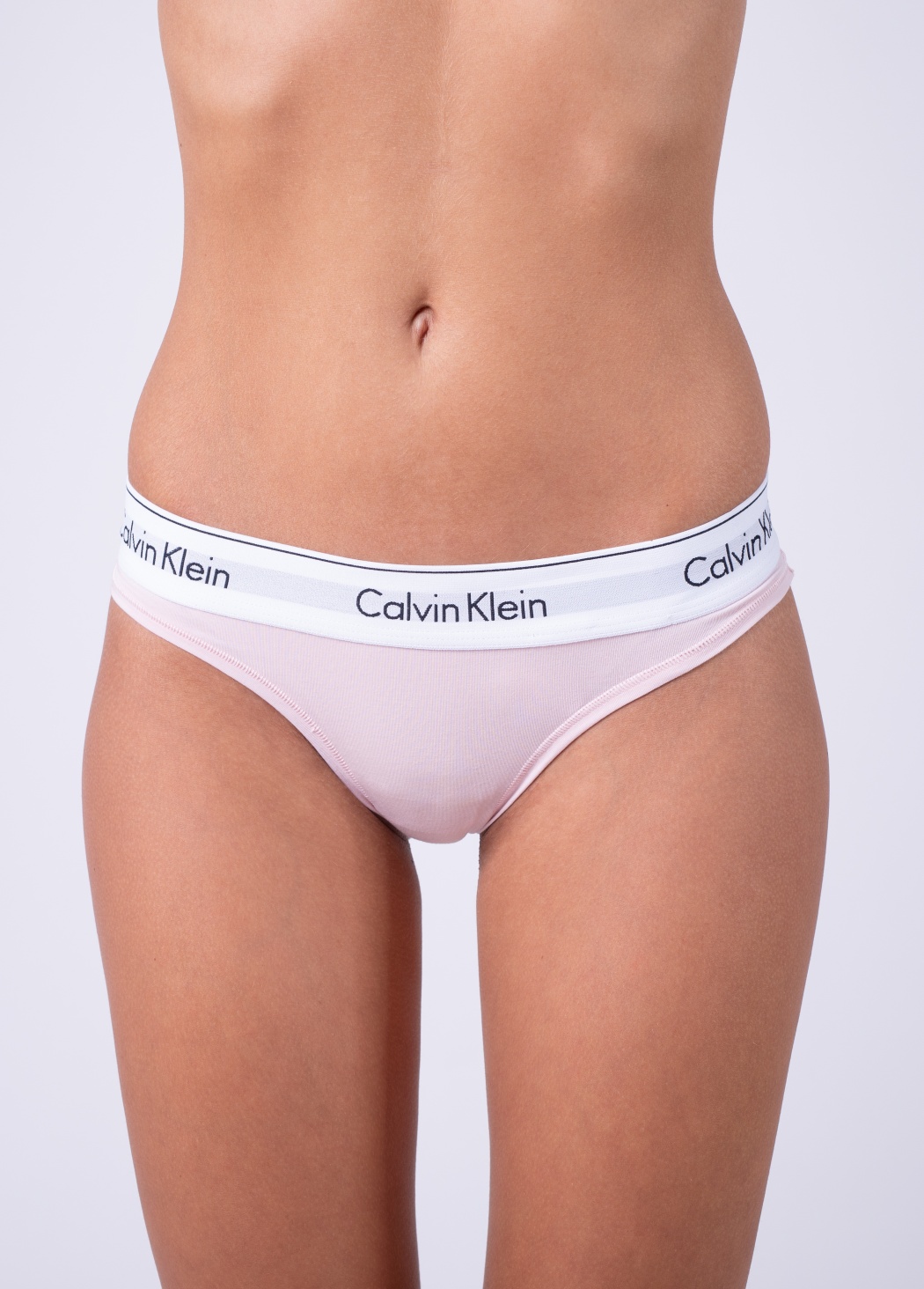 Levně Dámské kalhotky Calvin Klein F3787 M Sv. růžová