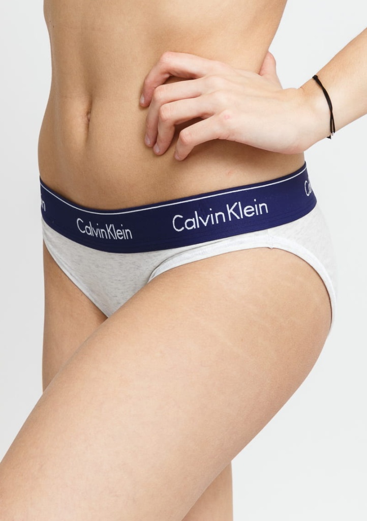 Levně Dámské kalhotky Calvin Klein F3787 L Sv. šedá